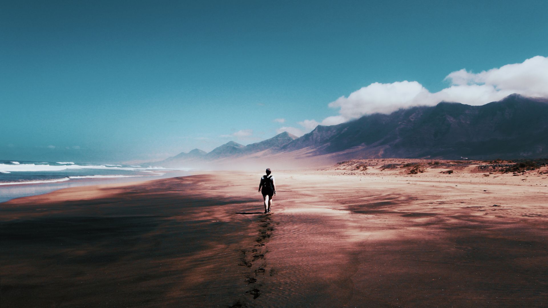 Woman walking by the beach