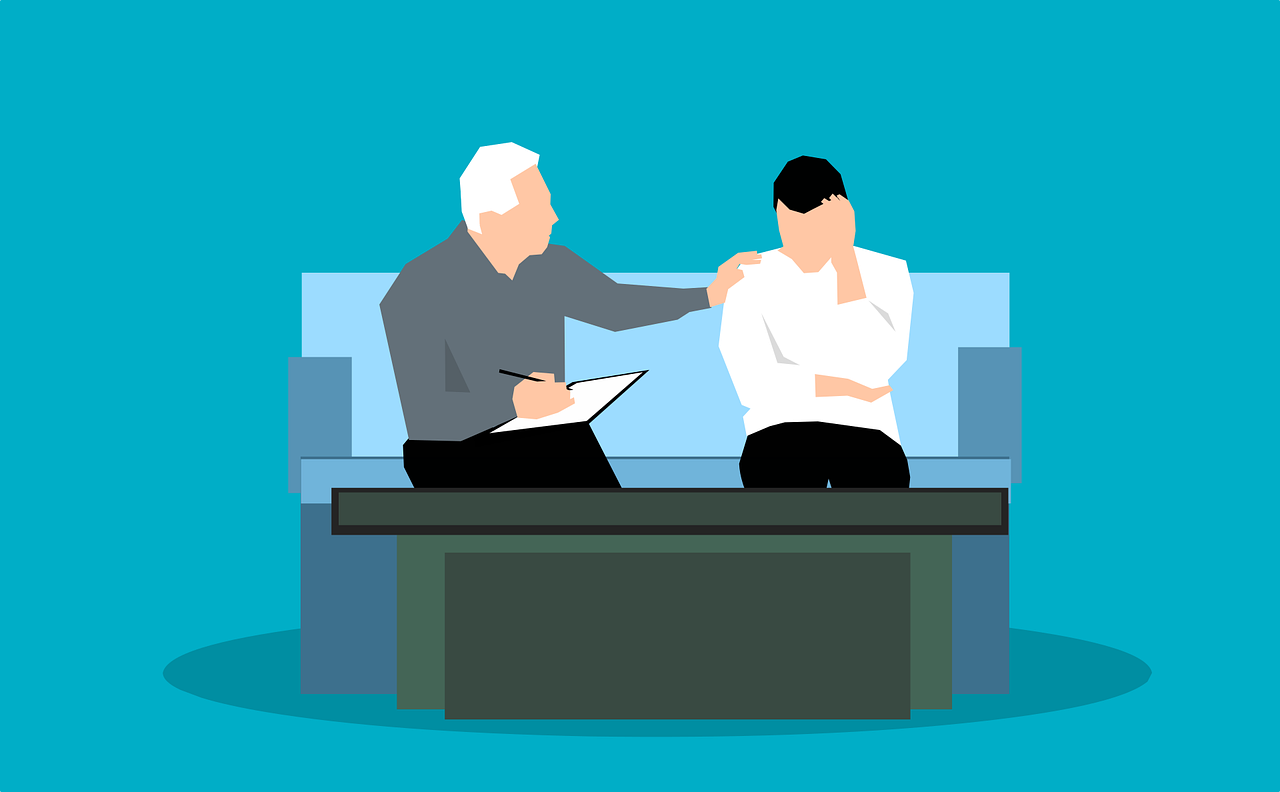 image of patient talking to their doctor