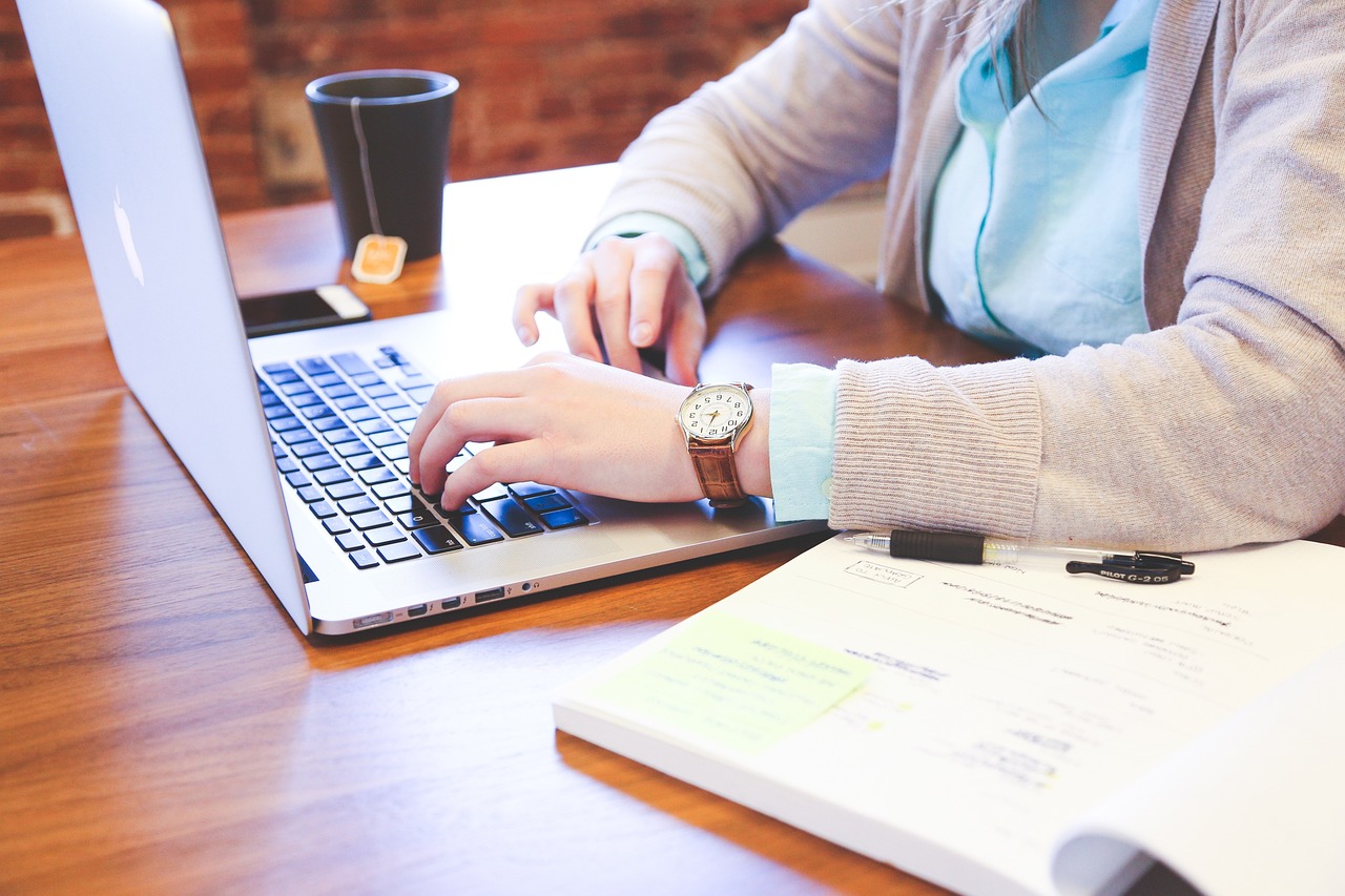 Photo by StartupStockPhotos image of woman using a laptop computer